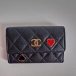 Chanel 23C black caviar leather poker charm flap card holder front