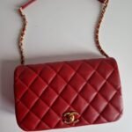 Chanel nailed flap bag in red calfskin GHW front