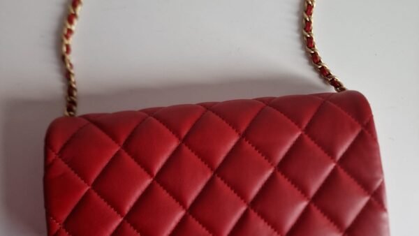 Chanel nailed flap bag in red calfskin GHW front