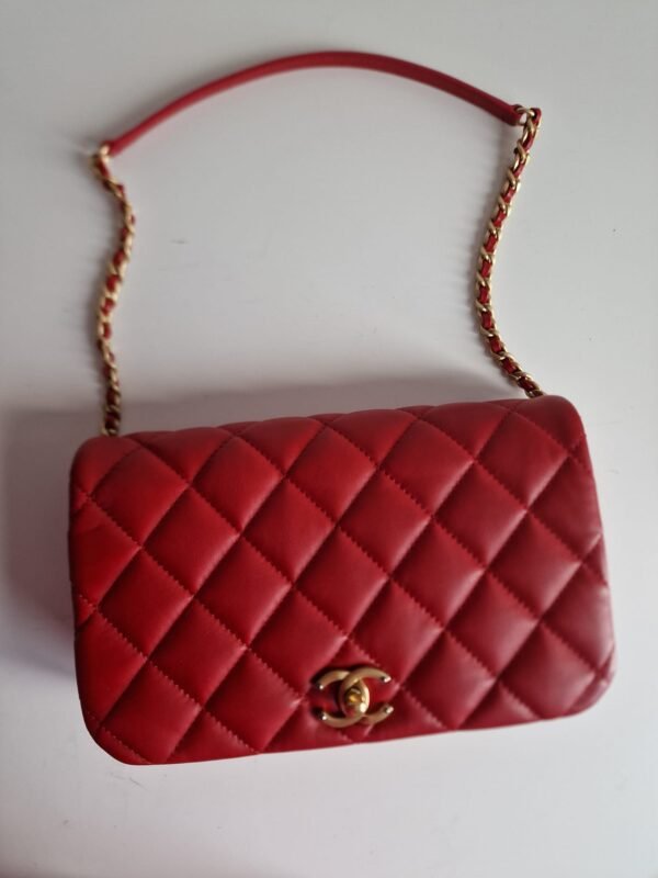 Chanel nailed flap bag in red calfskin GHW front