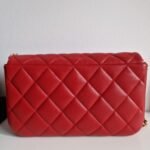 Chanel nailed flap bag in red calfskin GHW back