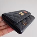 Chanel 23C black caviar leather poker charm flap card holder corner 1