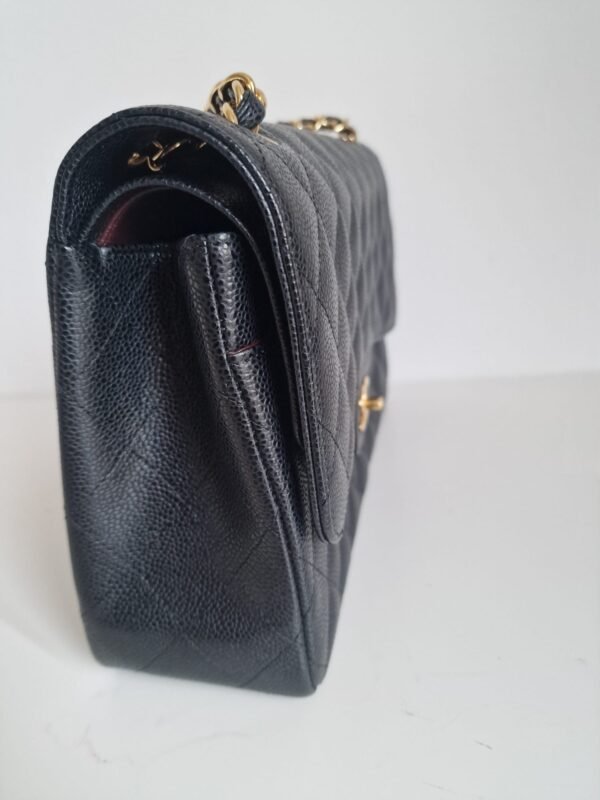 Chanel jumbo flap bag caviar leather GHW Side 1 Chanel jumbo flap bag caviar leather GHW Side 1