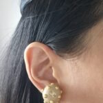 Chanel Earring gold CC in ear