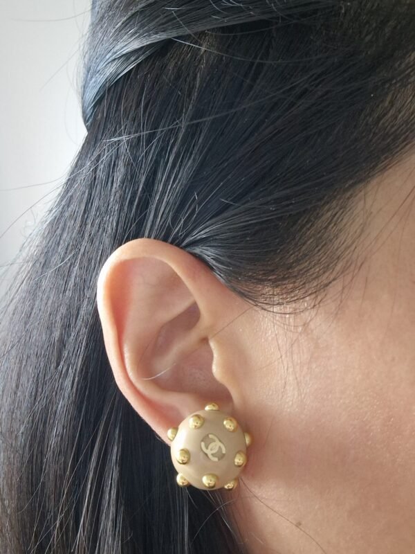 Chanel Earring gold CC in ear