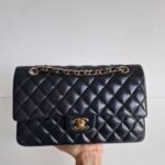 puffy Chanel medium classic in hand puffy Chanel medium classic in hand